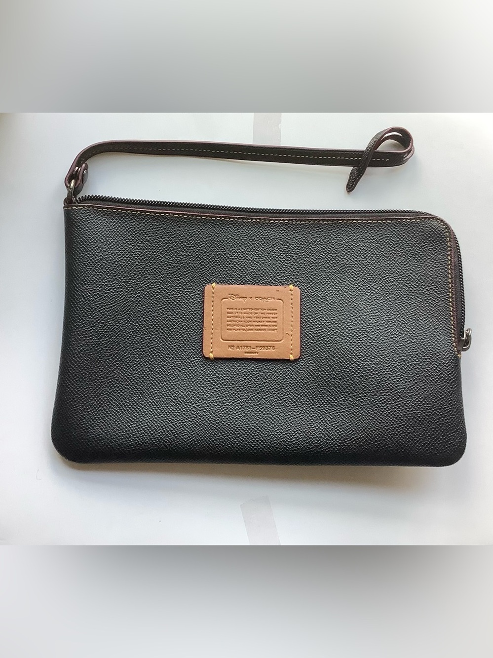 Coach Disney Black Leather Wristlet with Tan Patch